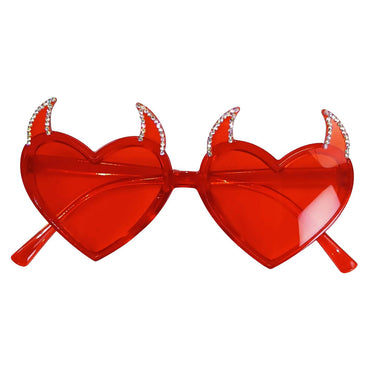 a pair of heart shaped glasses with horns on them